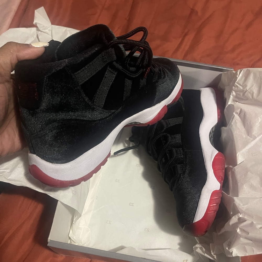 Nike Air Jordan 11 Retro Black and Red Sneakers